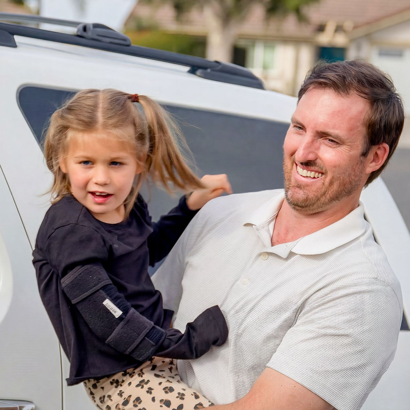 Photo of CalABLE Ambassador Clayton and his daughter