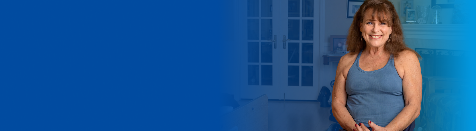 A smiling boy in a wheelchair