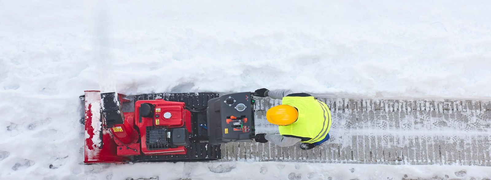 person with snowblower