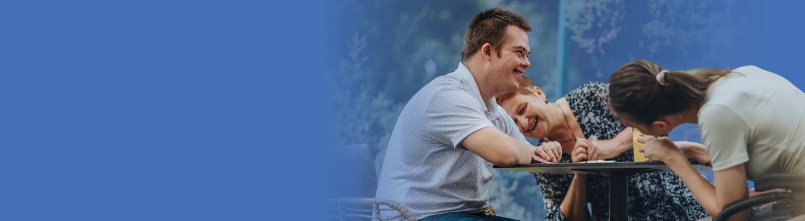 Man hugging young boy